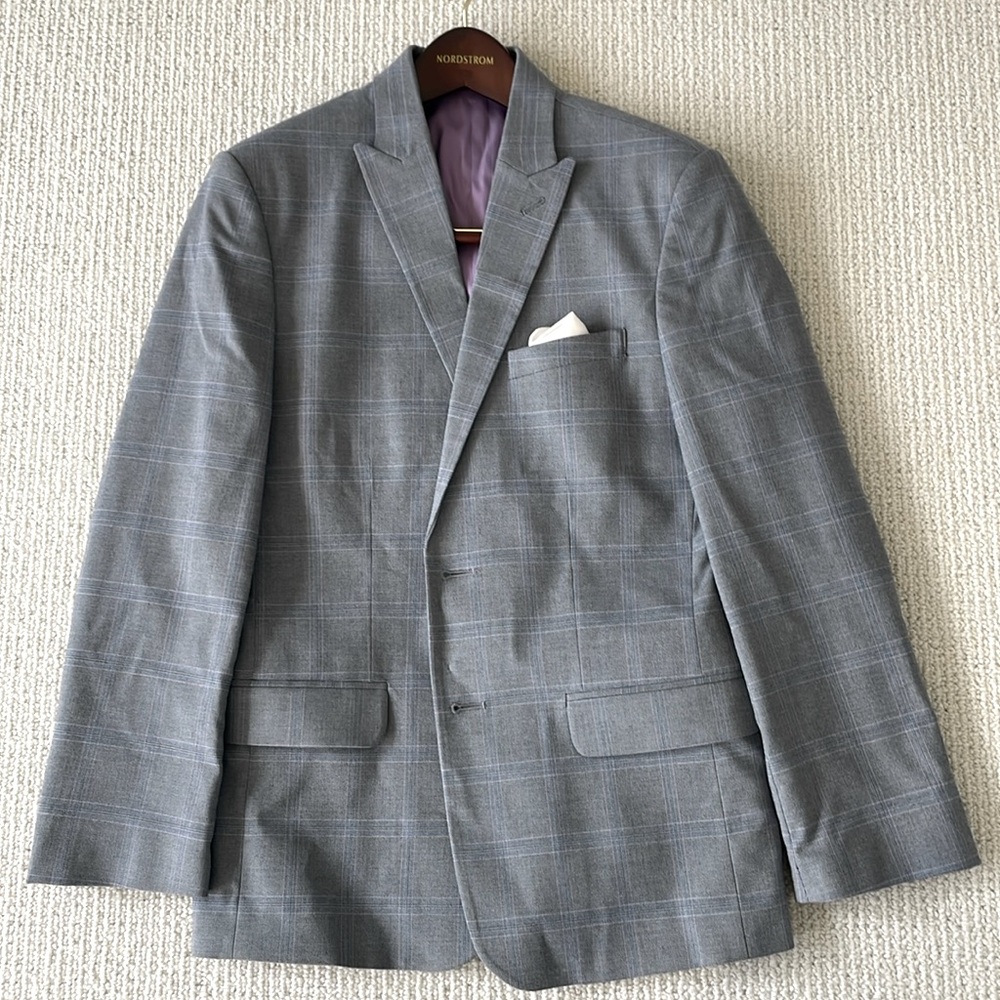 Worn once. Suit jacket by Calvin Klein. Boys 14 Husky.